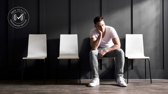 man sitting alone in waiting room
